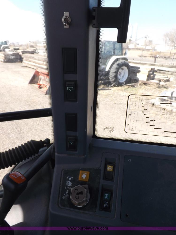 image for item I9104 1997 New Holland 7740SL MFWD tractor