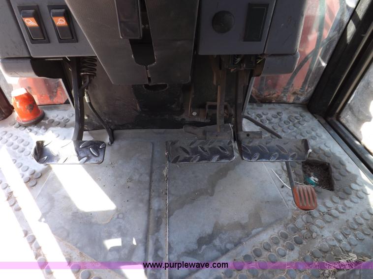 image for item I9104 1997 New Holland 7740SL MFWD tractor