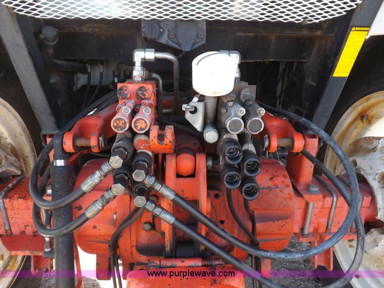 image for item I9104 1997 New Holland 7740SL MFWD tractor