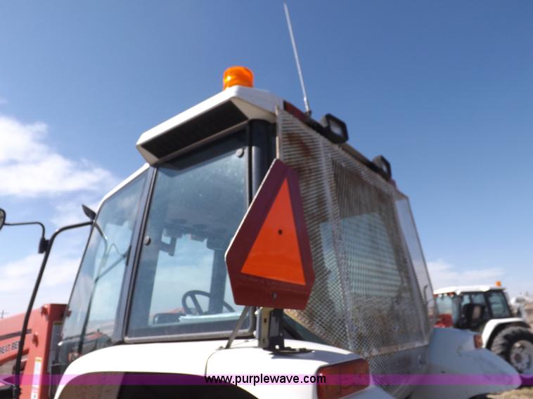 image for item I9104 1997 New Holland 7740SL MFWD tractor