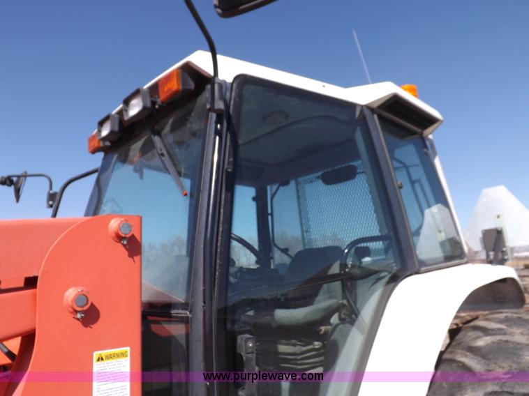 image for item I9104 1997 New Holland 7740SL MFWD tractor