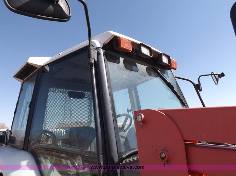 image for item I9104 1997 New Holland 7740SL MFWD tractor