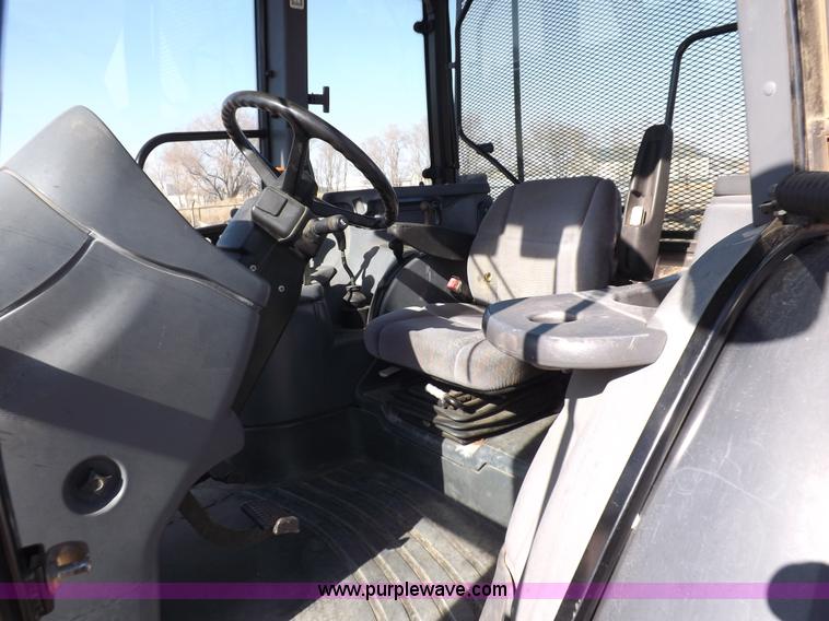 image for item I9105 1999 New Holland TS100 tractor