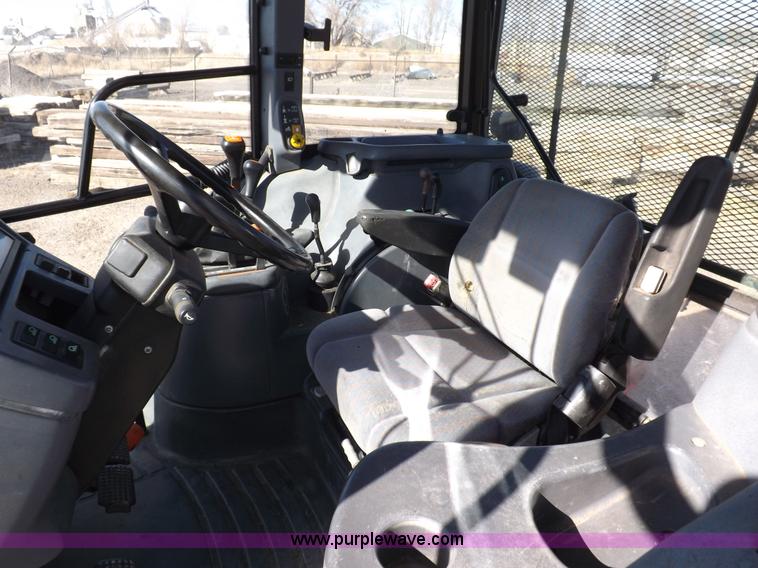 image for item I9105 1999 New Holland TS100 tractor