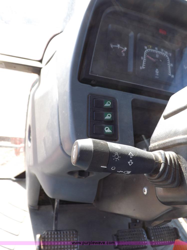 image for item I9105 1999 New Holland TS100 tractor