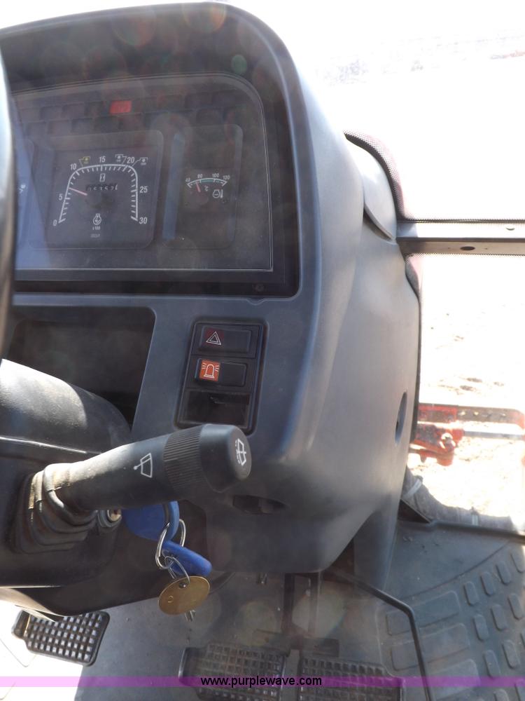 image for item I9105 1999 New Holland TS100 tractor