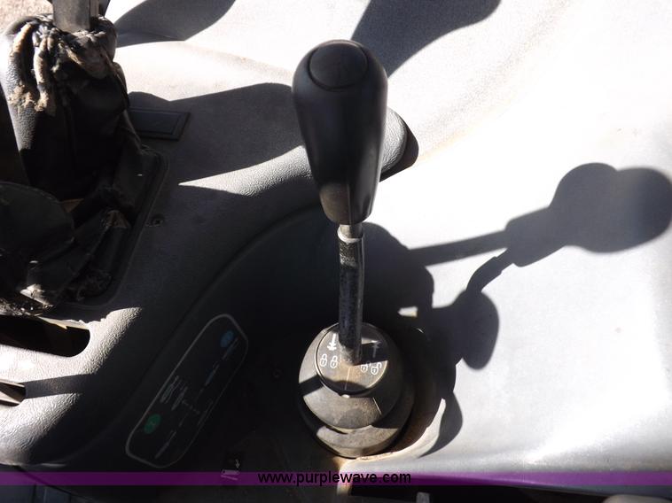 image for item I9105 1999 New Holland TS100 tractor