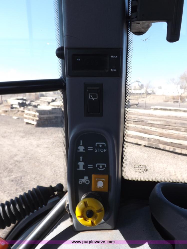 image for item I9105 1999 New Holland TS100 tractor