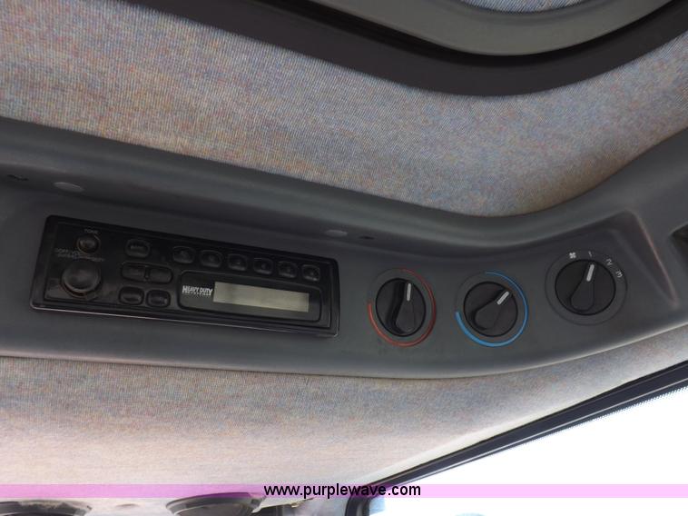 image for item I9105 1999 New Holland TS100 tractor