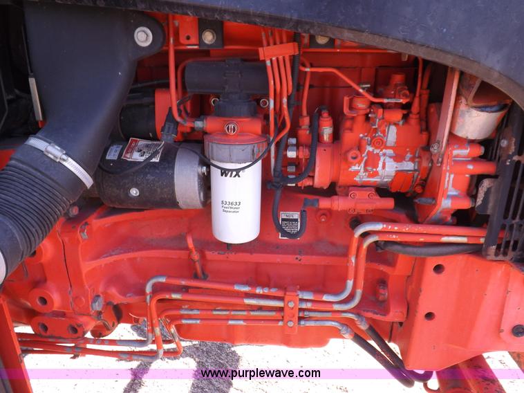 image for item I9105 1999 New Holland TS100 tractor