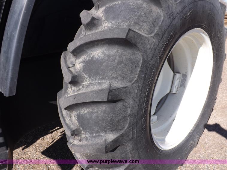 image for item I9105 1999 New Holland TS100 tractor