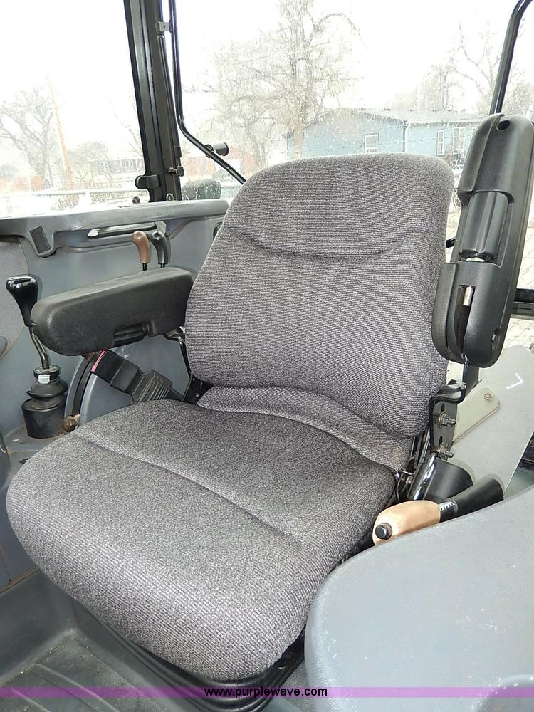 image for item I9350 1999 New Holland TS100 tractor