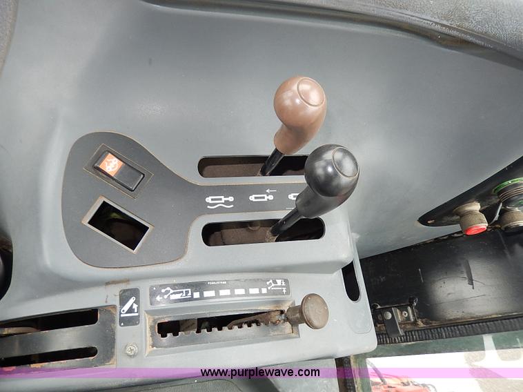 image for item I9350 1999 New Holland TS100 tractor