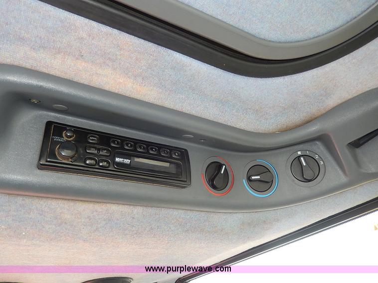 image for item I9350 1999 New Holland TS100 tractor