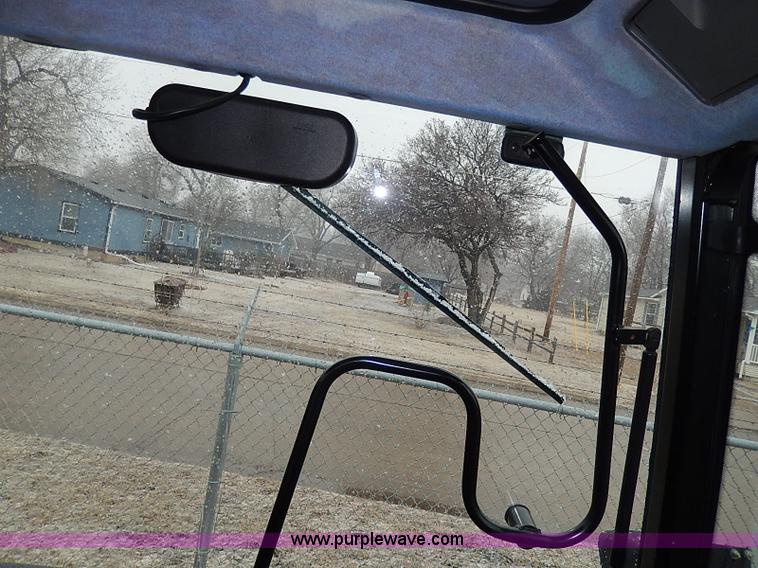 image for item I9350 1999 New Holland TS100 tractor