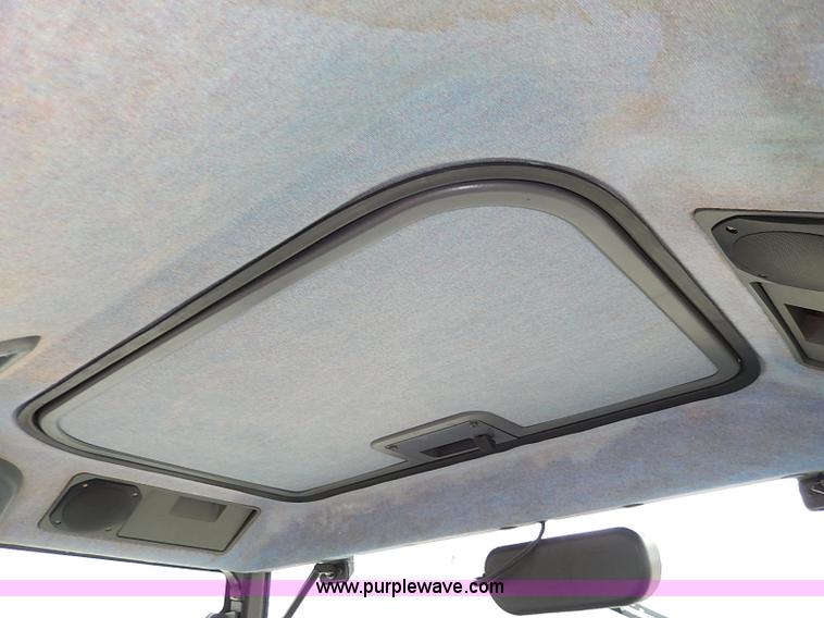 image for item I9350 1999 New Holland TS100 tractor