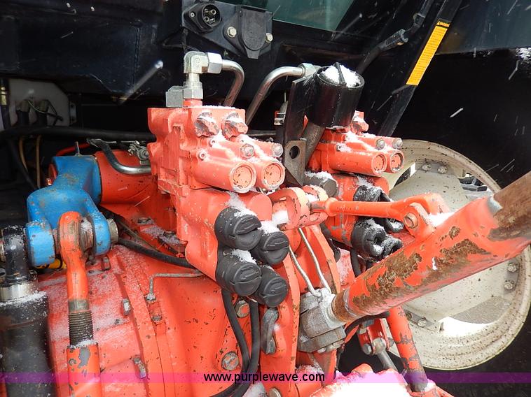 image for item I9350 1999 New Holland TS100 tractor