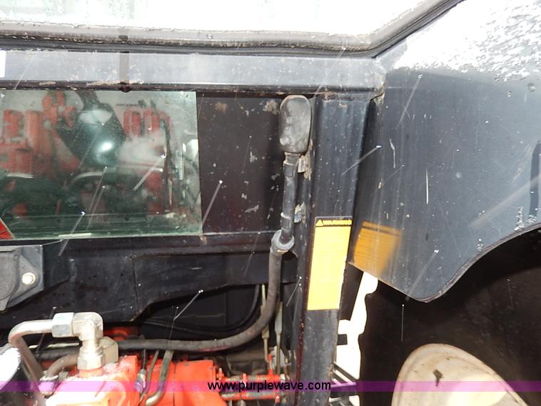 image for item I9350 1999 New Holland TS100 tractor