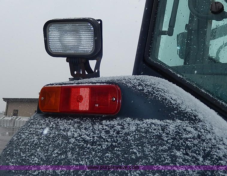 image for item I9350 1999 New Holland TS100 tractor