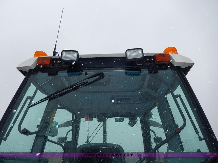 image for item I9350 1999 New Holland TS100 tractor