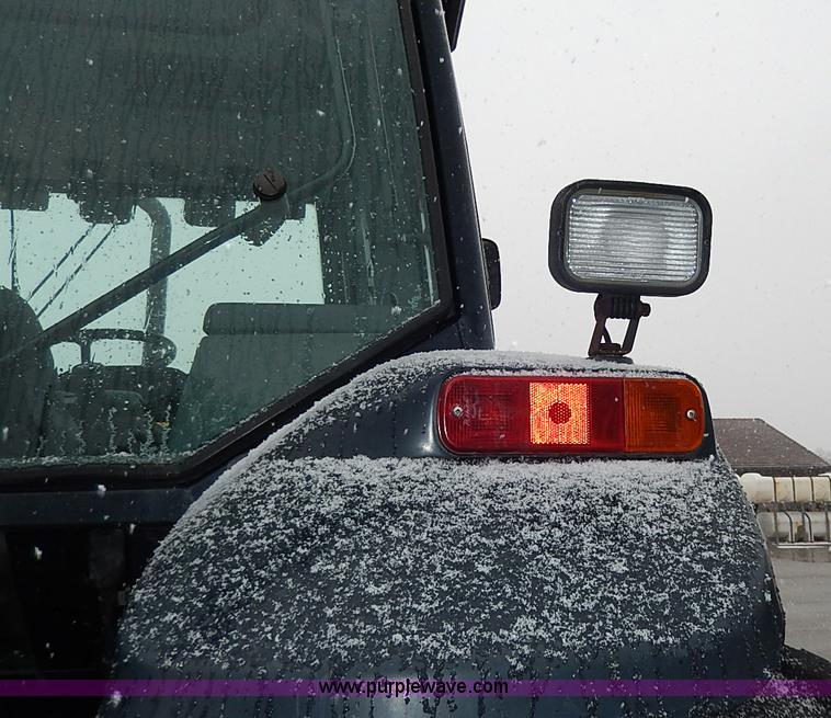 image for item I9350 1999 New Holland TS100 tractor