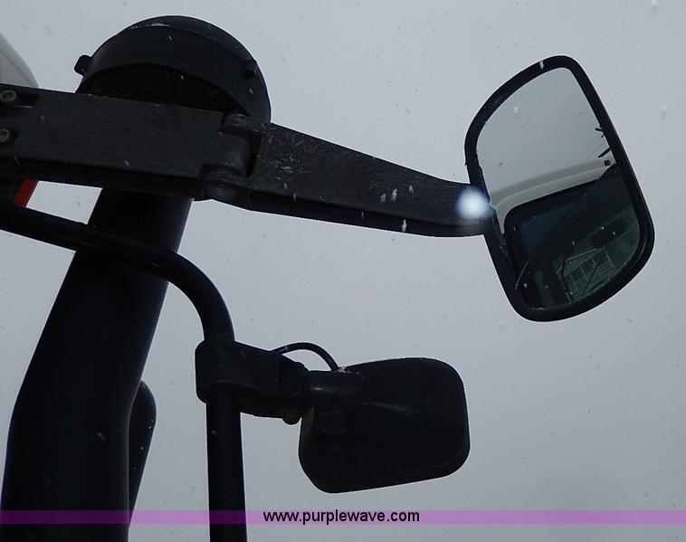 image for item I9350 1999 New Holland TS100 tractor