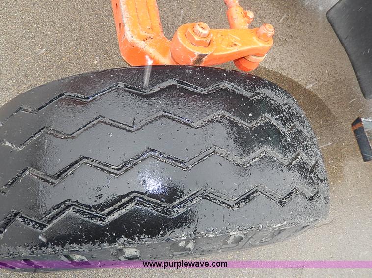 image for item I9350 1999 New Holland TS100 tractor