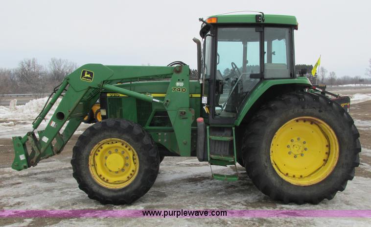 image for item G8824 1999 John Deere 7410 MFWD tractor