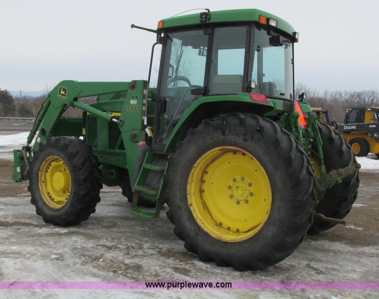 image for item G8824 1999 John Deere 7410 MFWD tractor