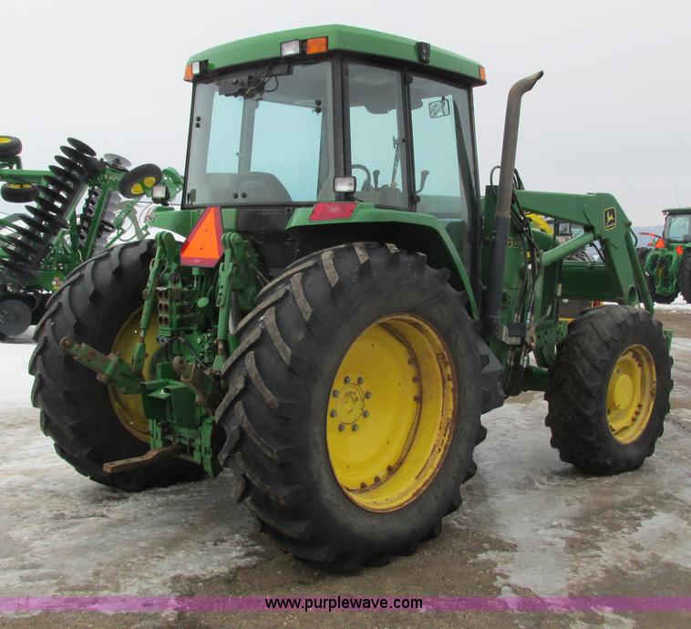image for item G8824 1999 John Deere 7410 MFWD tractor