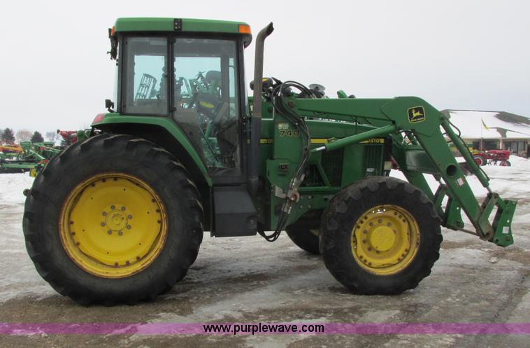 image for item G8824 1999 John Deere 7410 MFWD tractor