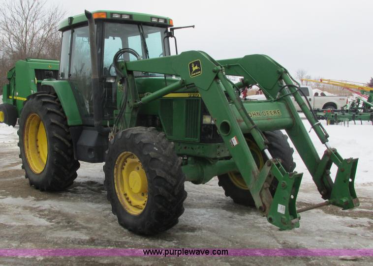 image for item G8824 1999 John Deere 7410 MFWD tractor