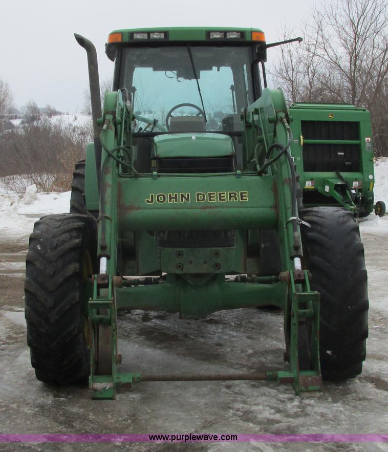 image for item G8824 1999 John Deere 7410 MFWD tractor