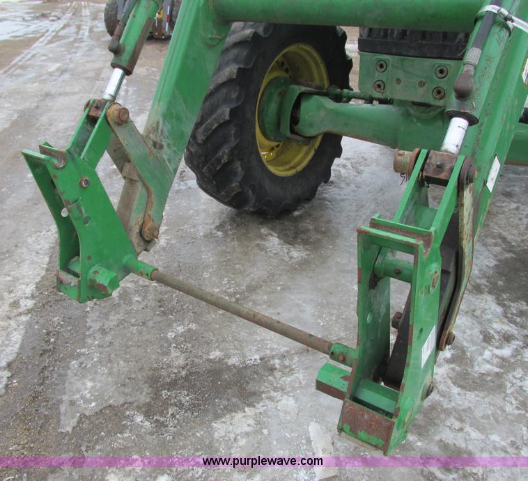 image for item G8824 1999 John Deere 7410 MFWD tractor