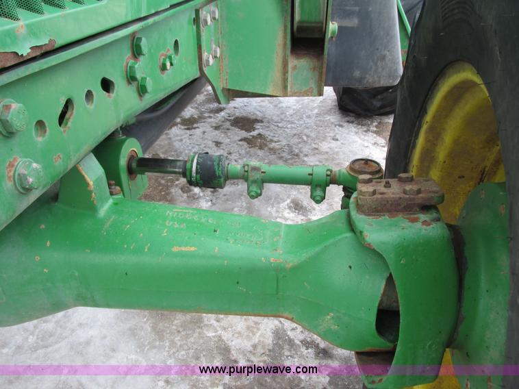 image for item G8824 1999 John Deere 7410 MFWD tractor