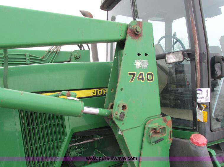 image for item G8824 1999 John Deere 7410 MFWD tractor