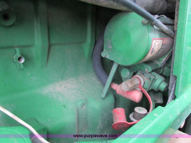 image for item G8824 1999 John Deere 7410 MFWD tractor