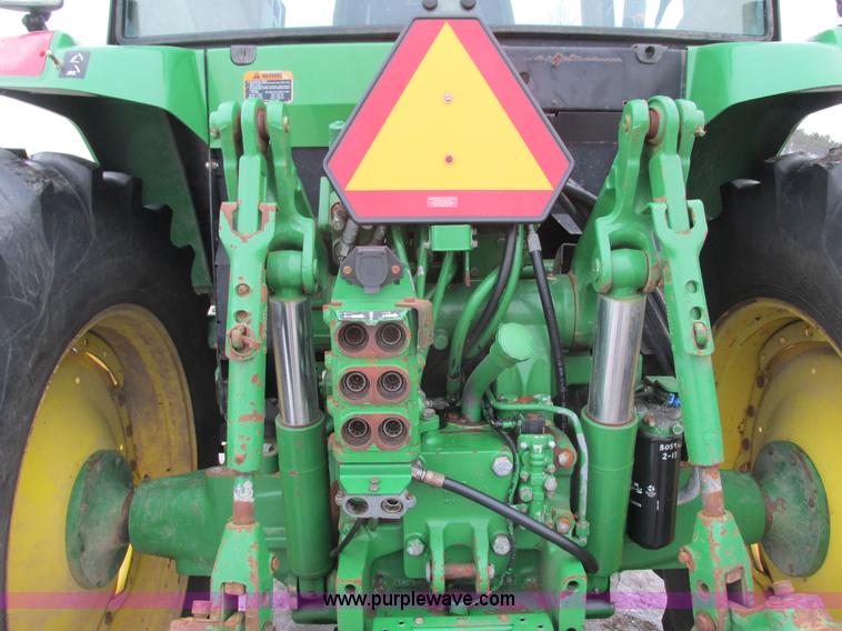 image for item G8824 1999 John Deere 7410 MFWD tractor