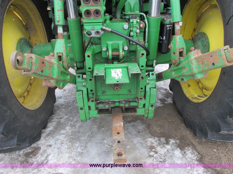 image for item G8824 1999 John Deere 7410 MFWD tractor