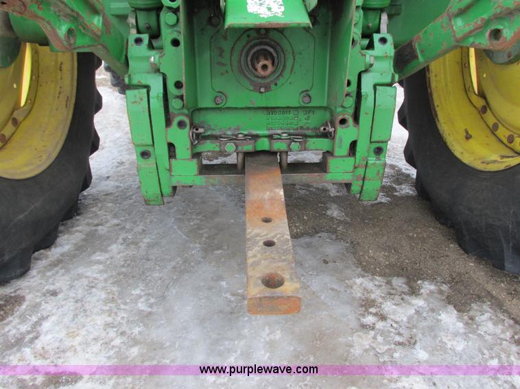 image for item G8824 1999 John Deere 7410 MFWD tractor