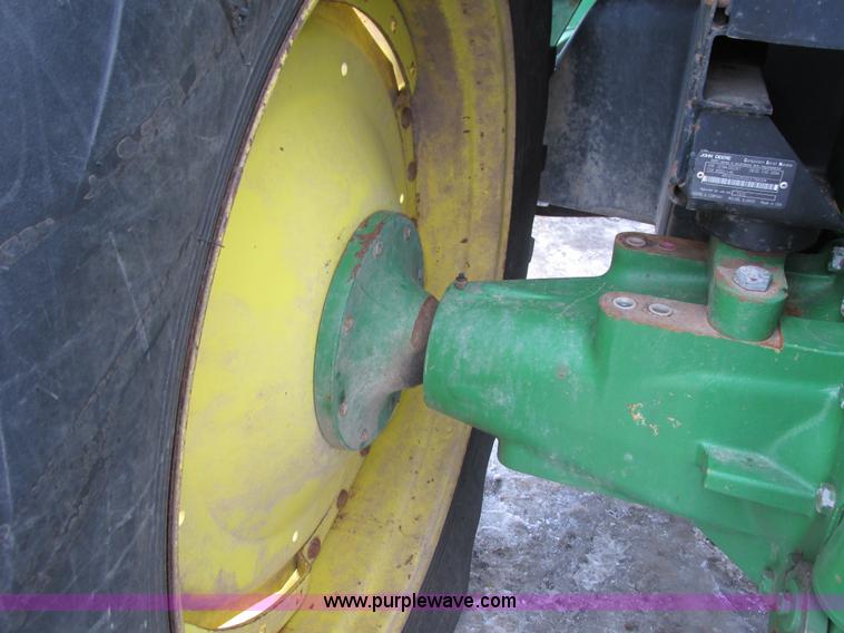 image for item G8824 1999 John Deere 7410 MFWD tractor