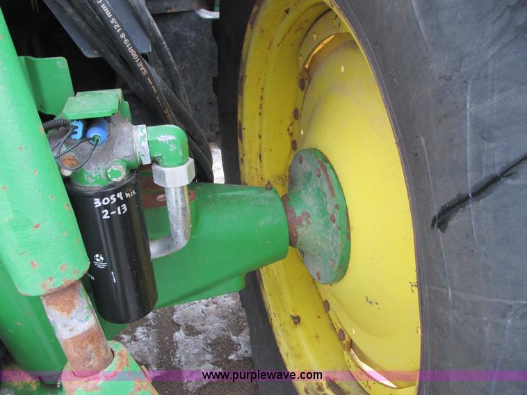 image for item G8824 1999 John Deere 7410 MFWD tractor