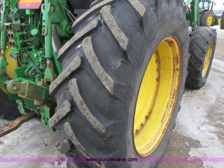 image for item G8824 1999 John Deere 7410 MFWD tractor
