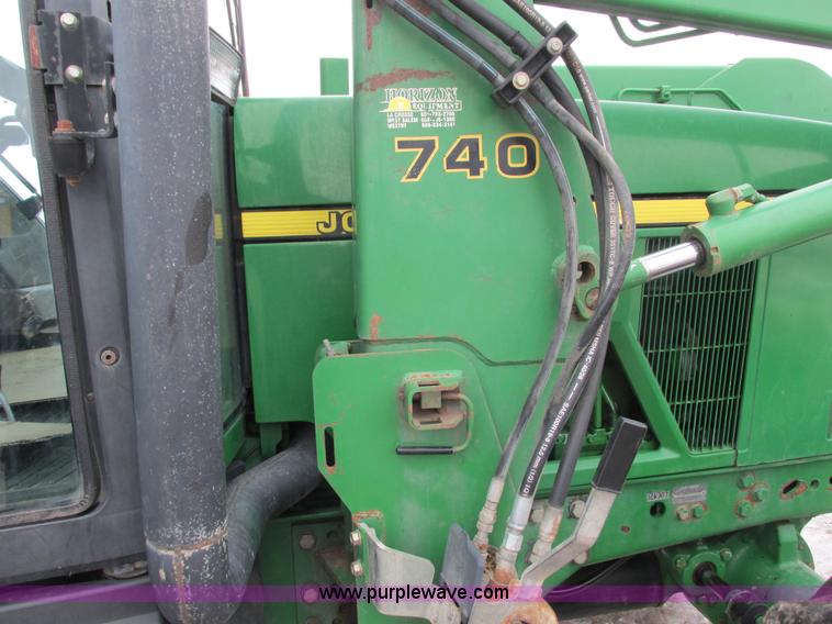 image for item G8824 1999 John Deere 7410 MFWD tractor