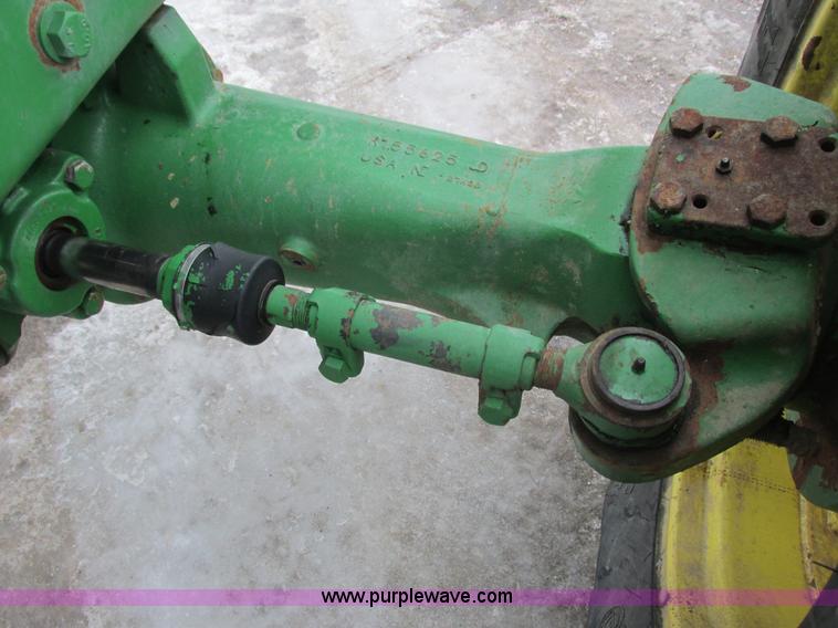 image for item G8824 1999 John Deere 7410 MFWD tractor