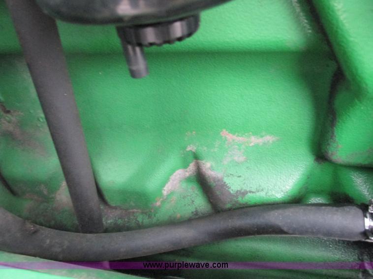 image for item G8824 1999 John Deere 7410 MFWD tractor