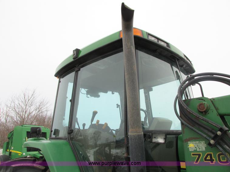 image for item G8824 1999 John Deere 7410 MFWD tractor