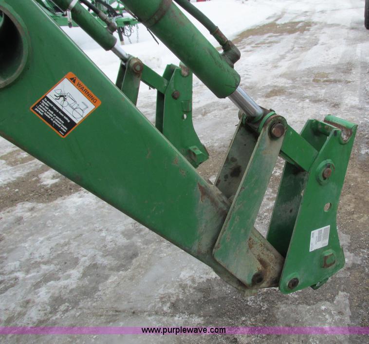 image for item G8824 1999 John Deere 7410 MFWD tractor