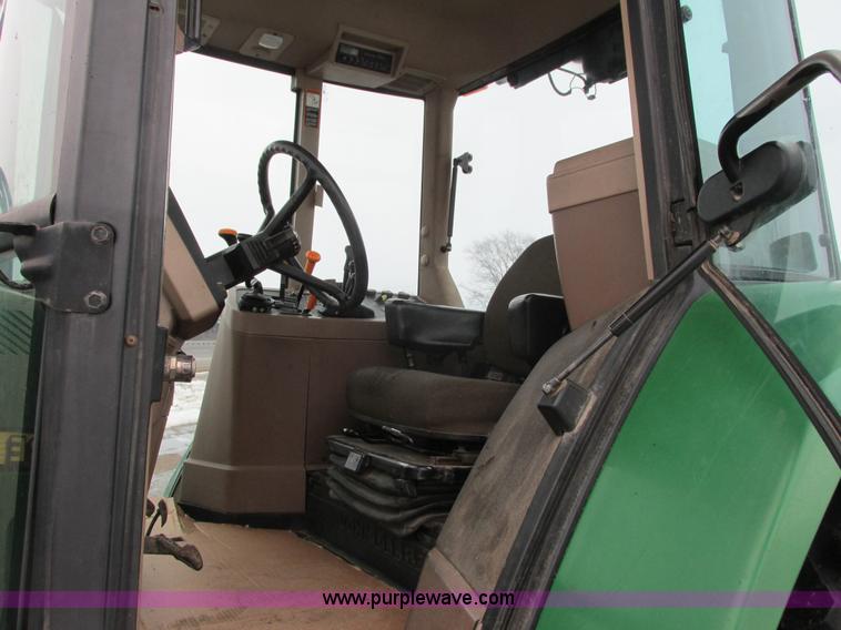 image for item G8824 1999 John Deere 7410 MFWD tractor