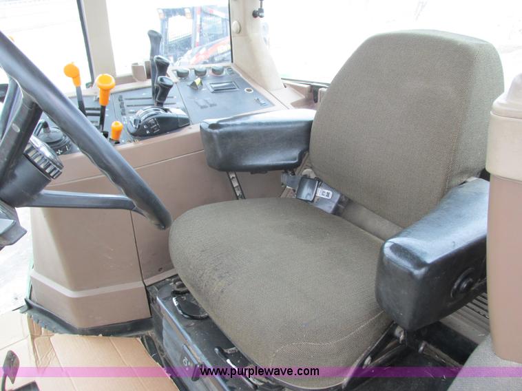 image for item G8824 1999 John Deere 7410 MFWD tractor